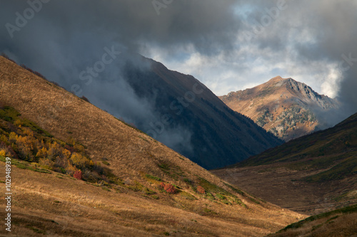 Cloud in the mountains in autumn. Caucasus. Sochi Region. Russia.