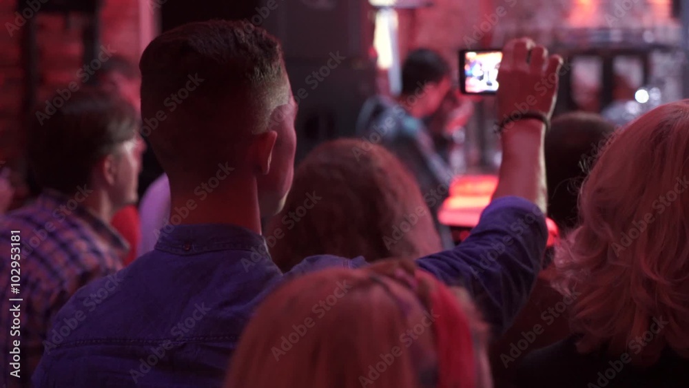 people videoshooting to phone, concert, musicants. people videoshooting to phone, concert, musicants.
