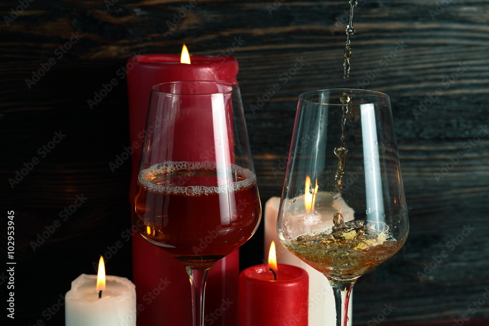 Pouring white wine into the wineglass Pouring white wine into the wineglass