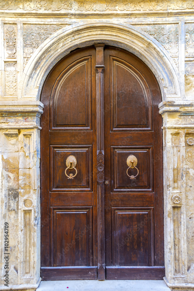 Wooden entrance in the old city of Chania in Crete, Greece