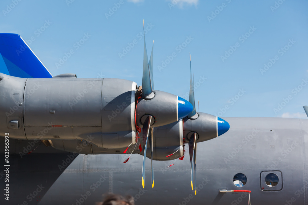Blue propeller passenger plane close up Blue propeller passenger plane close up