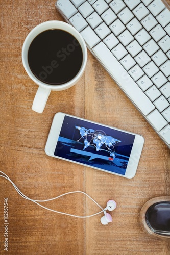 Composite image of coffee and white smartphone with headphones