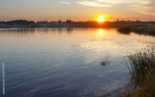 Sunset lake view. © wildman