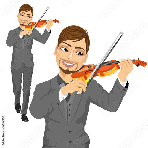 Young male violinist playing an acoustic violin