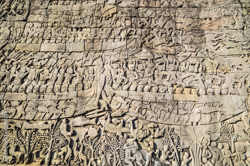 Historic Khmer bas-relief showing Hindu legend scenes at Bayon temple