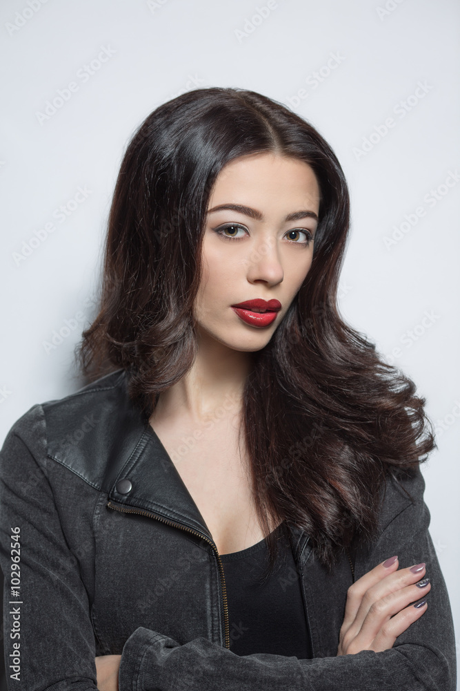 Fashion model woman with dark red lips in studio Fashion model woman with dark red lips in studio