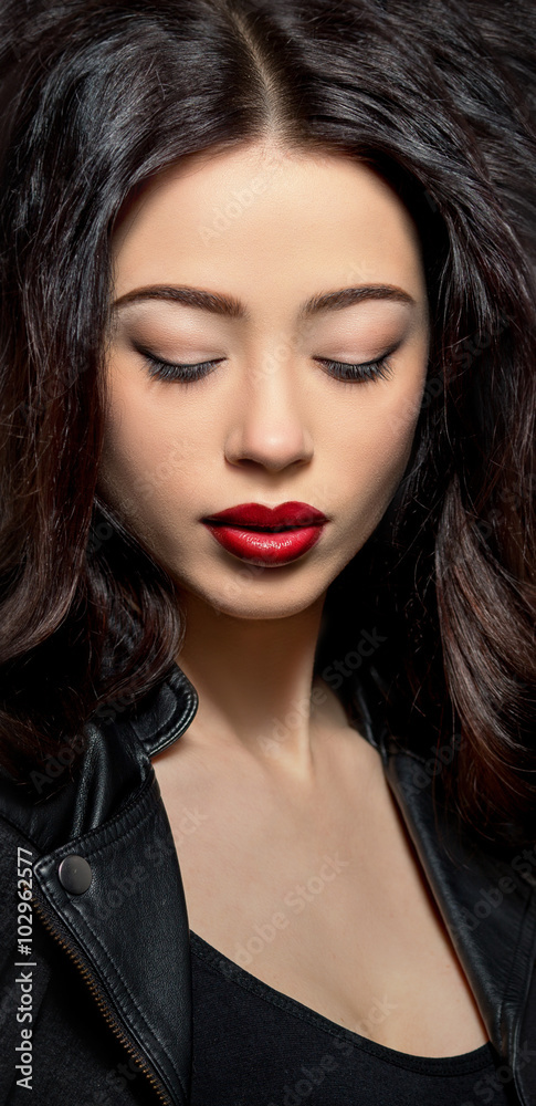 Fashion model woman with dark red lips in studio Fashion model woman with dark red lips in studio