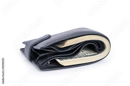 a purse is complete money isolated on a background dollars