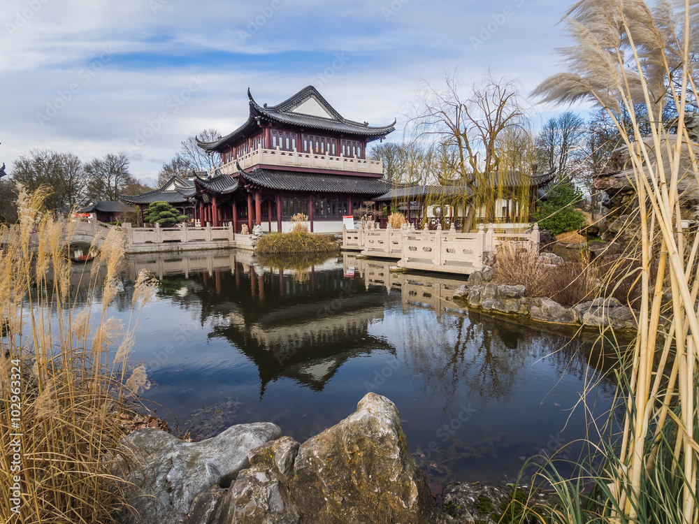 lake in front of a japanese style house