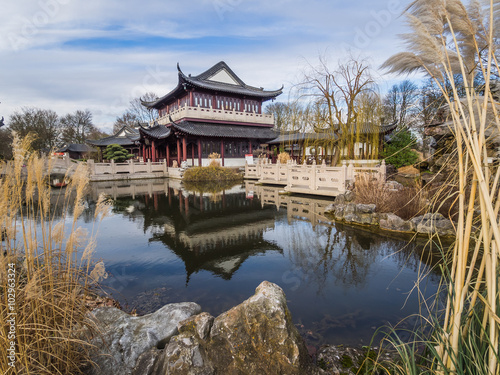 lake in front of a japanese style house