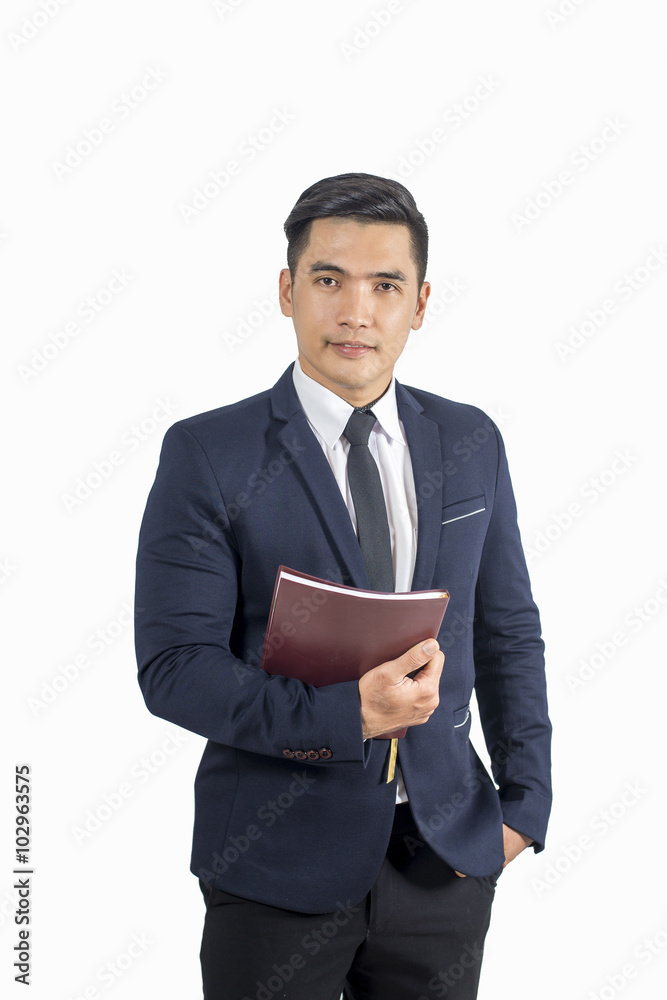 Handsome businessman holding book isolate on white background, a Handsome businessman holding book isolate on white background, a