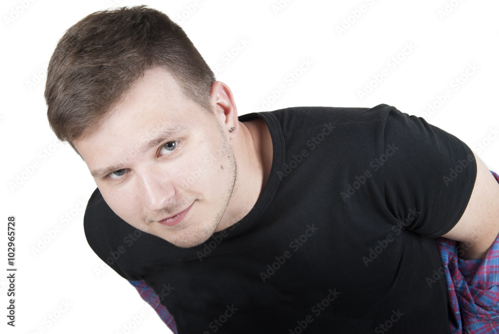 Handsome young man undressing (on white) Handsome young man undressing (on white)