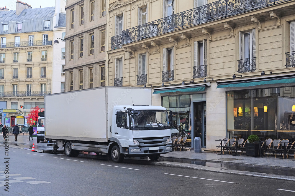 Paris, France, February 10, 2016: trucks on a Paris street, France