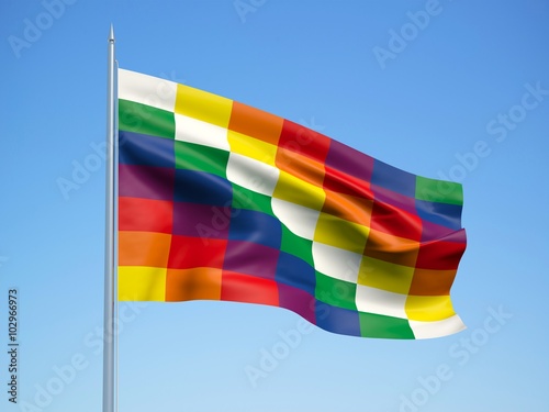 Wiphala 3d flag floating in the wind with a blue sky background  photo