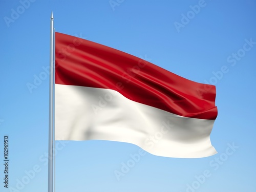 Indonesia 3d flag floating in the wind with a blue sky background 