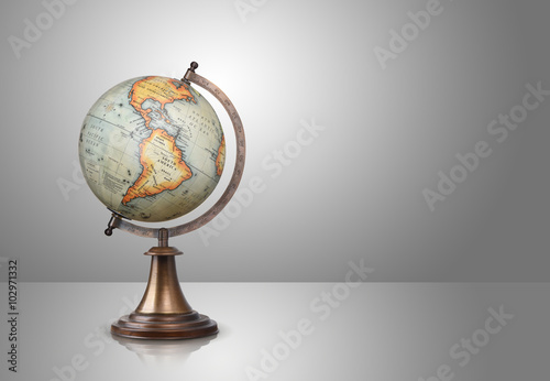Fototapeta Naklejka Na Ścianę i Meble -  old style globe on gray background