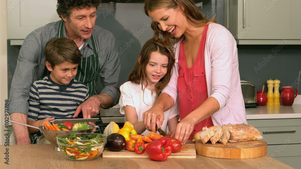 Cute family preparing lunch Cute family preparing lunch