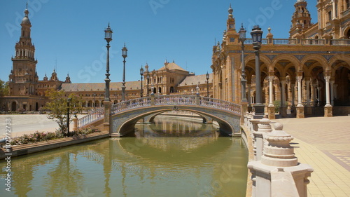Bridge and canal at Spain Square (Plaza de Espana) in the Maria Luisa Park, in Seville. It is a landmark example of the Renaissance Revival style in Spanish architecture.