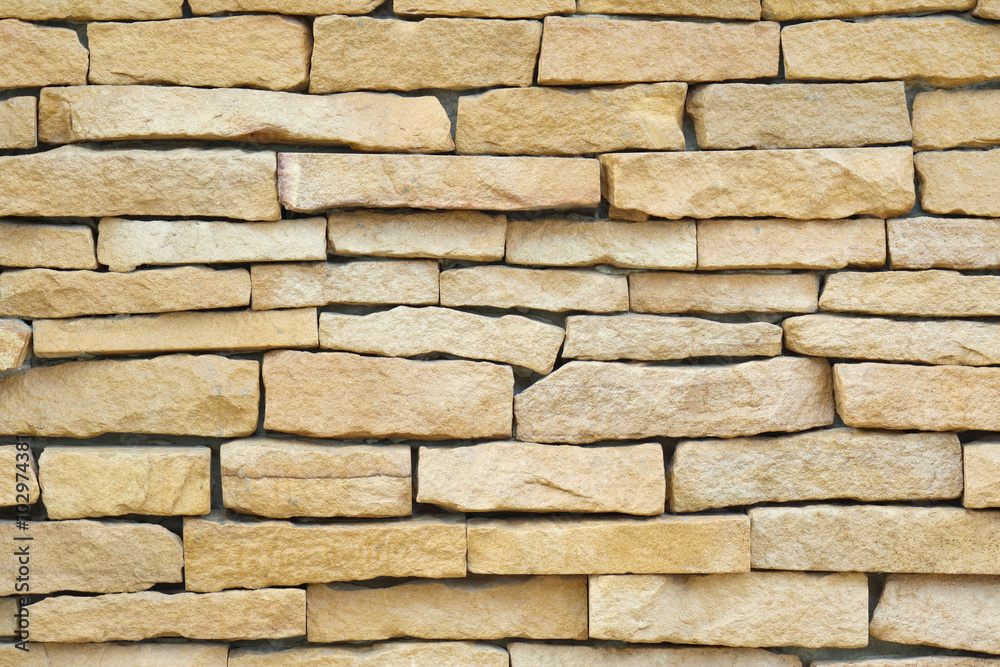 Fototapeta premium Exterior brown brick wall, textured wall background.