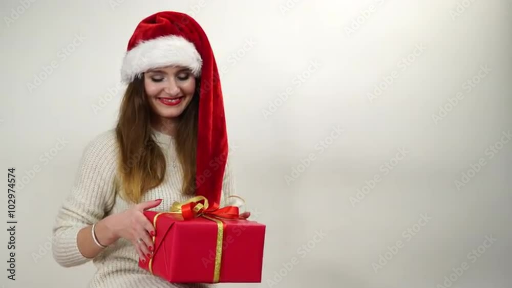 Woman wrapping gift present tying ribbon bow 4K. Woman wrapping gift present tying ribbon bow 4K.