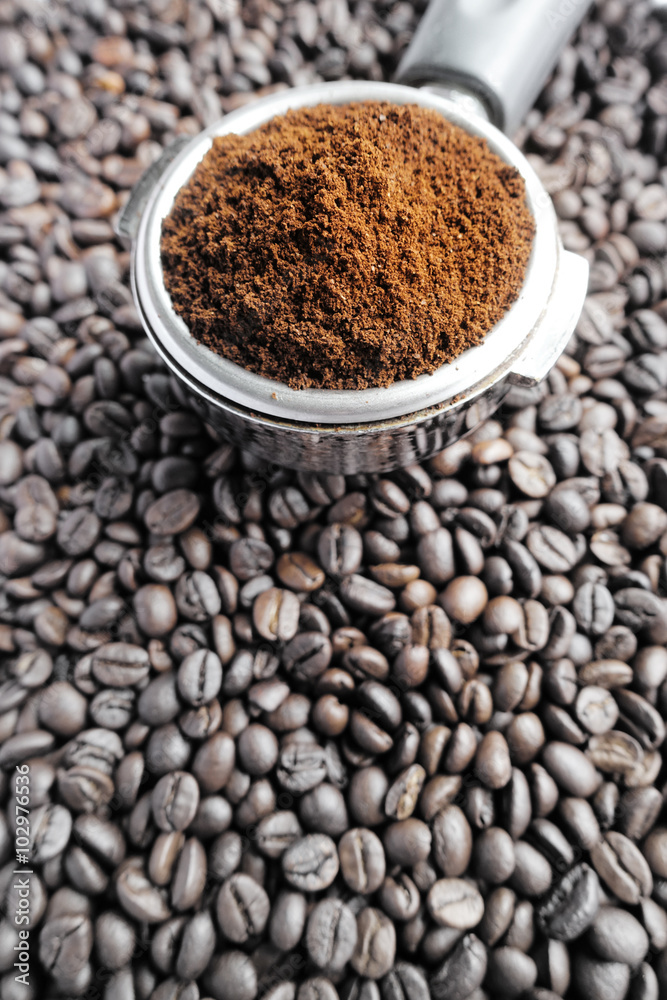 Close up of coffee beans background take with selective color technique and art lighting Close up of coffee beans background take with selective color technique and art lighting
