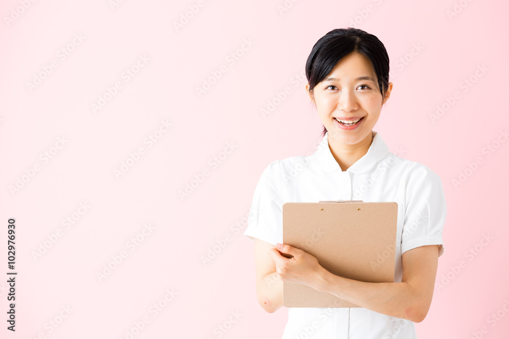 portrait of asian nurse isolated on pink background portrait of asian nurse isolated on pink background