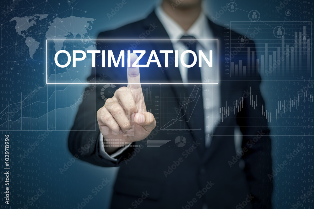Businessman hand touching OPTIMIZATION button on virtual screen Businessman hand touching OPTIMIZATION button on virtual screen