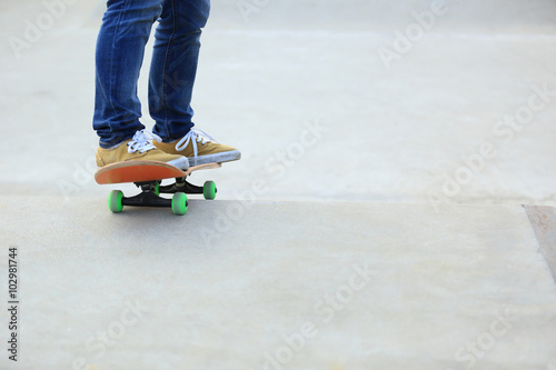 skateboarding woman legs at skatepark © lzf