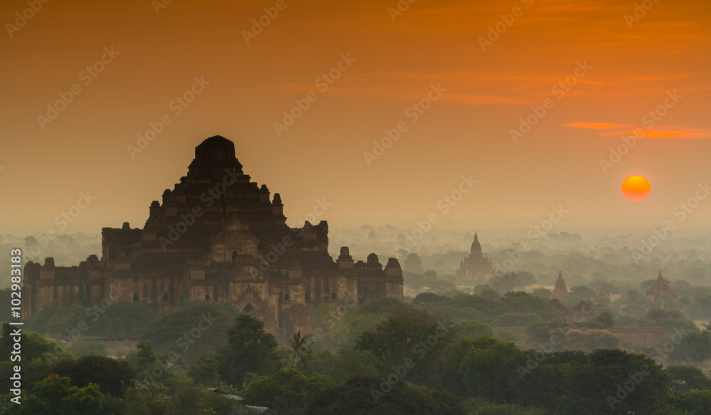 The silhouette of ancient temple in Bagan while sunrise , Myanma