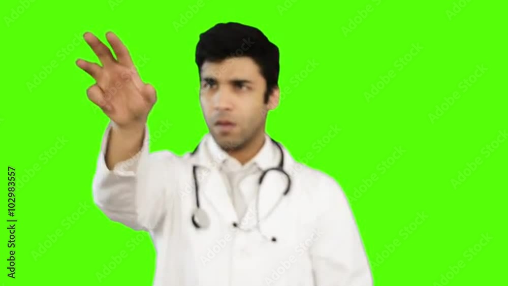 Locked-on shot of male doctor giving presentation against green background Locked-on shot of male doctor giving presentation against green background