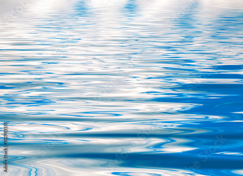 Abstract series of waves on the water surface
