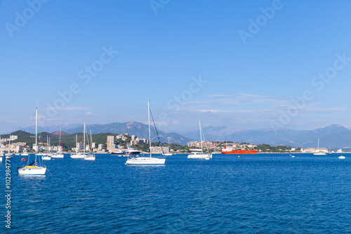 Sailing yachts and motor boats moored in bay of Ajaccio