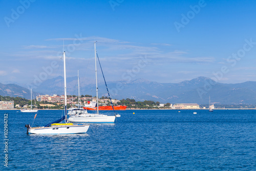 Sailing yachts and motorboats moored in bay of Ajaccio © evannovostro