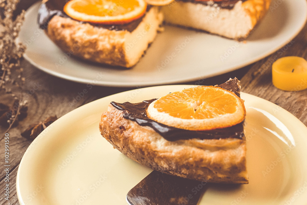 Orange cake on the wooden background Orange cake on the wooden background