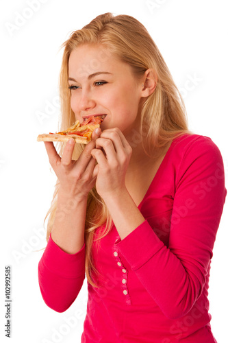 Woman with slice of delicious pizza  can t wait to bite in it.