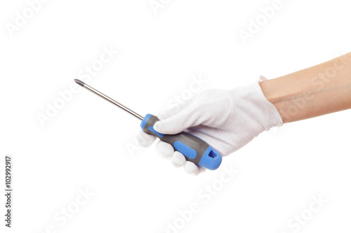 A screwdriver in the hand, isolated