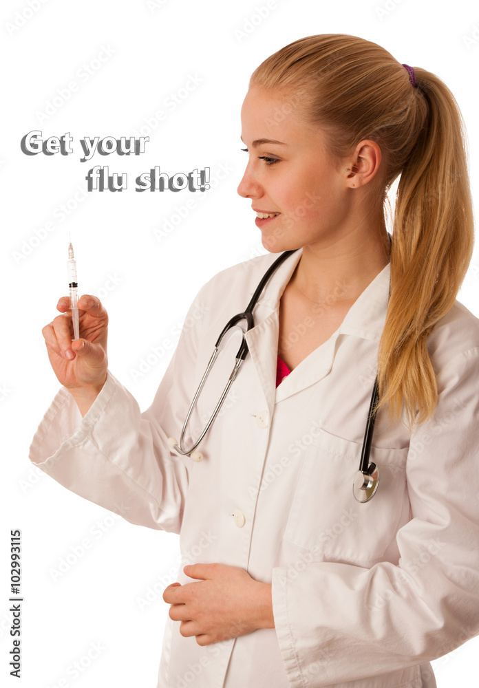 Doctor with stethoscope around neck and needle in hand promoting Doctor with stethoscope around neck and needle in hand promoting