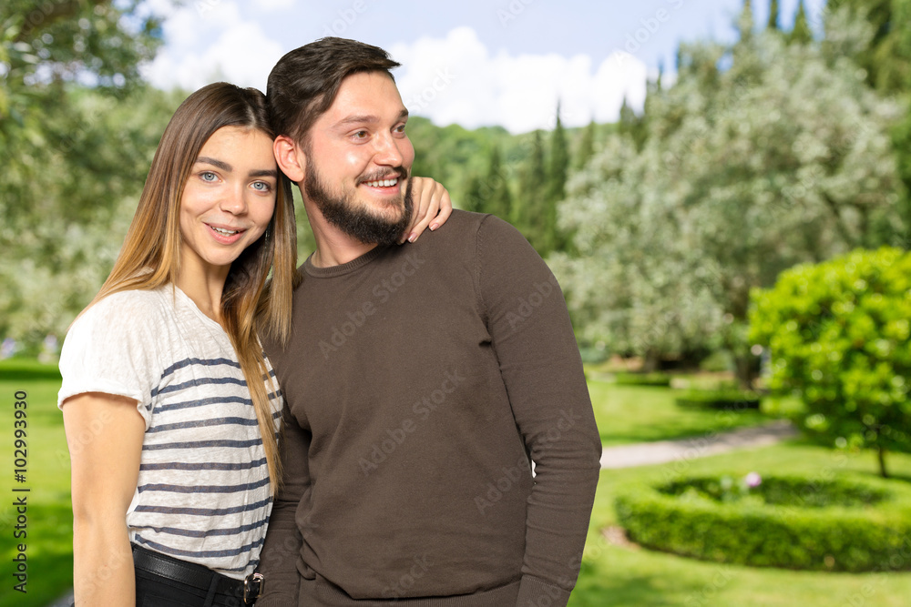 Cheerful young couple standing