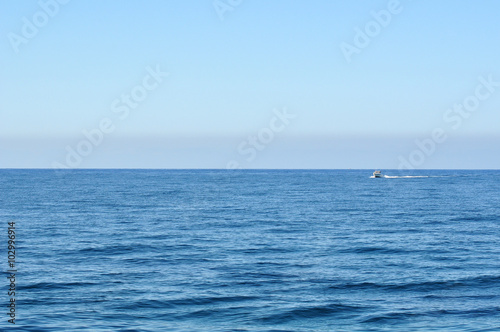 Endless beautiful sea and boat