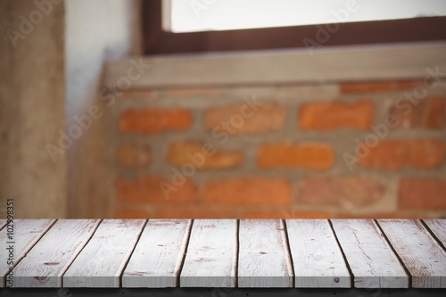 Composite image of wooden table