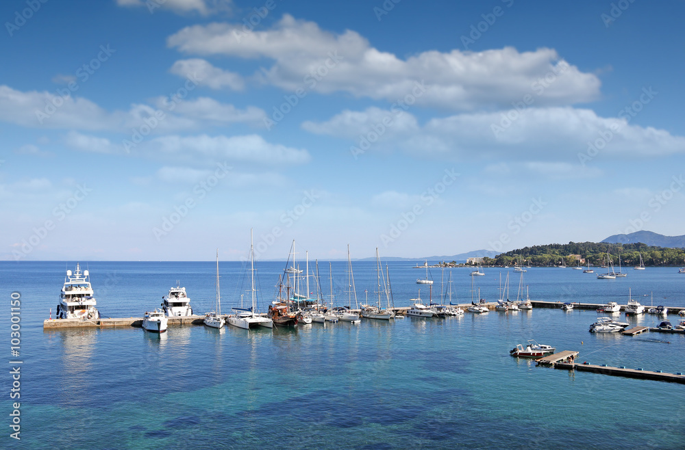 Fototapeta premium Corfu town marine with yachts and sailboats
