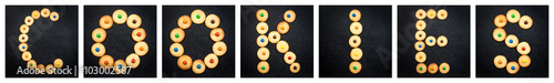 Collage of the uppercase letter - word COOKIES . Alphabet childish colorful homemade cookie isolated on black background