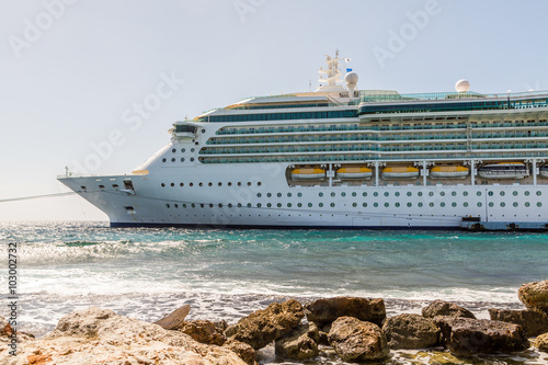 Konstfotografi Cruise Ship Moored in Sun by Seawall