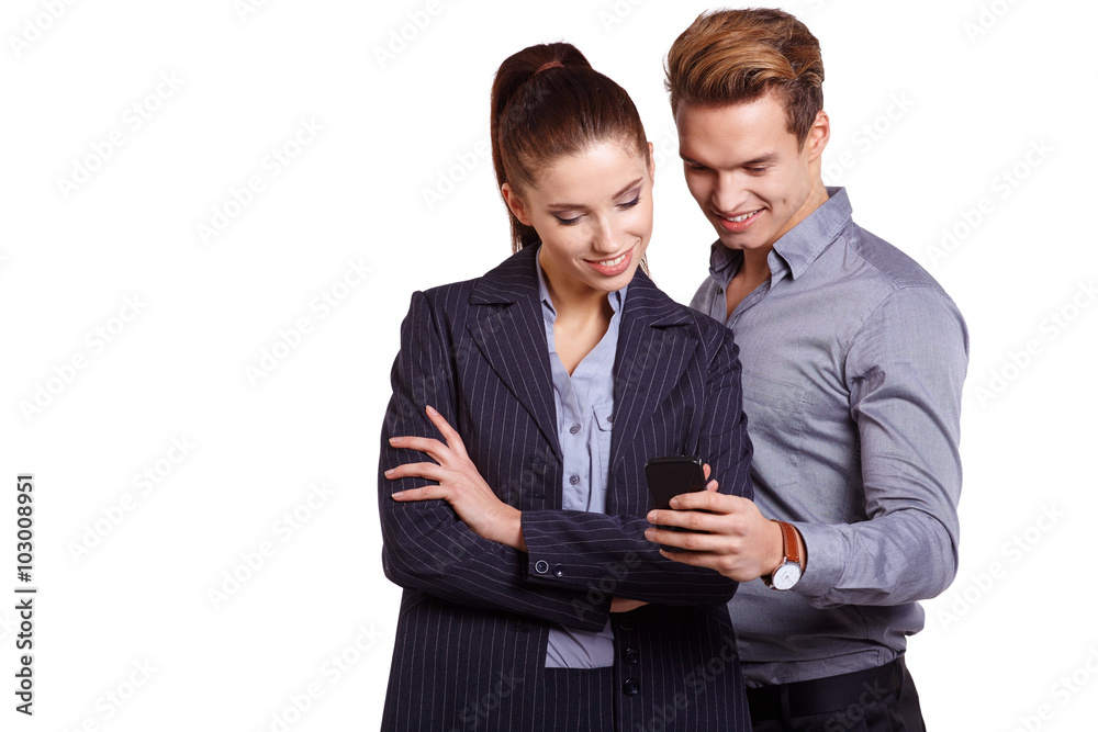 Business colleagues looking at mobile phone Business colleagues looking at mobile phone