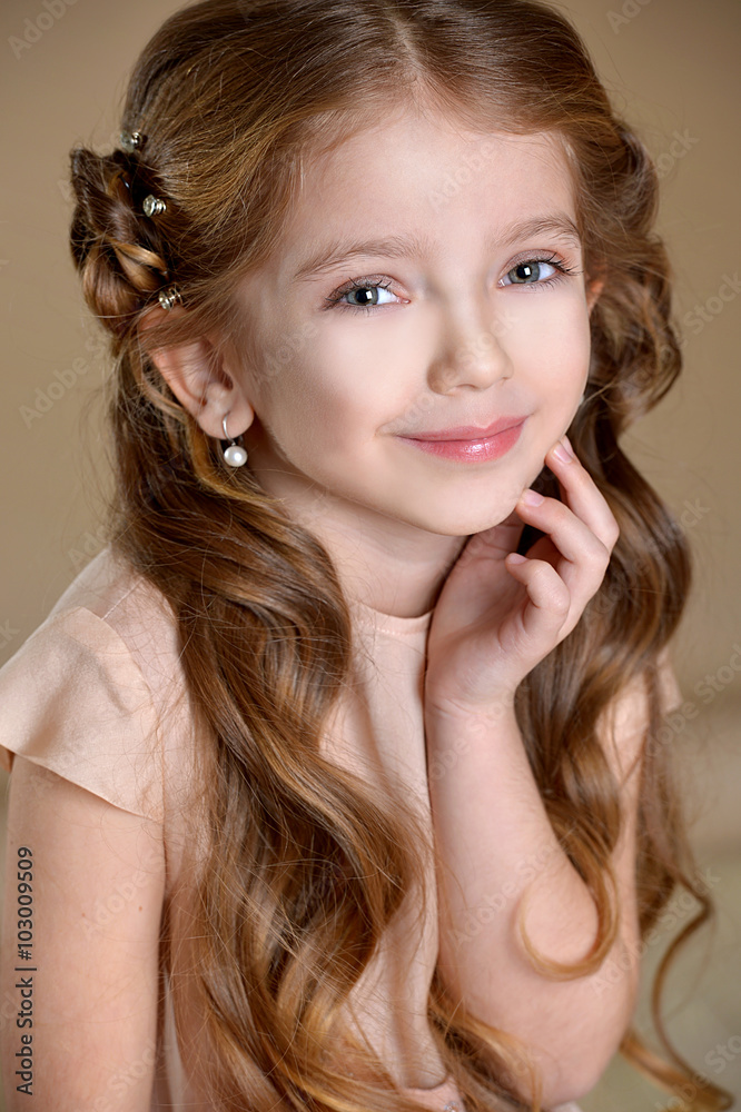 Little girl with long healthy brunette hair with creative braid hairdo on health care theme
Little girl with long healthy brunette hair with creative braid hairdo on health care theme