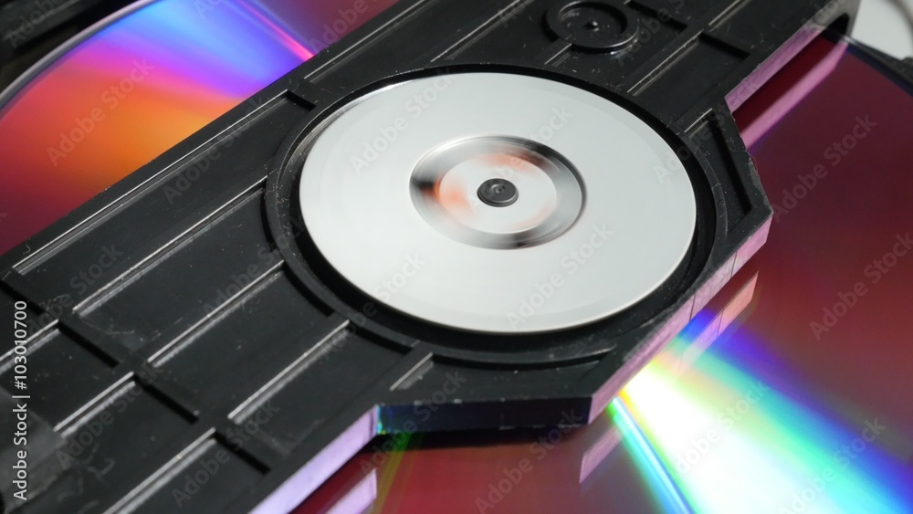 Compact disc  mechanism inserting media 4K 2160p UltraHD footage - DVD and CD player disc reading  mechanism sequence  4K 3840X2160 UHD video