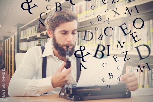 Composite image of hipster with smoking pipe working on typewriter