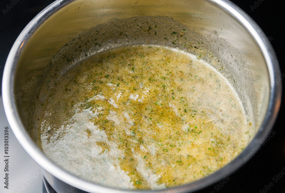 Preparing sauce with spices for vegetables in pan Preparing sauce with spices for vegetables in pan