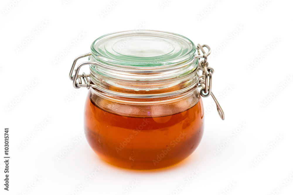 Honey jar on white background Honey jar on white background