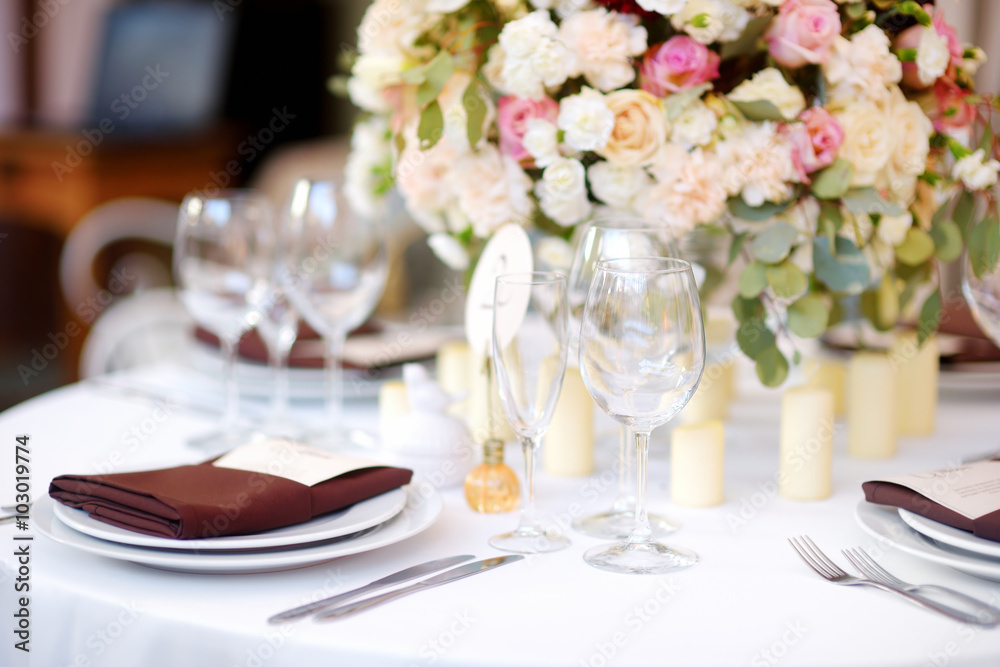 Beautiful table set for some festive event or wedding reception Beautiful table set for some festive event or wedding reception